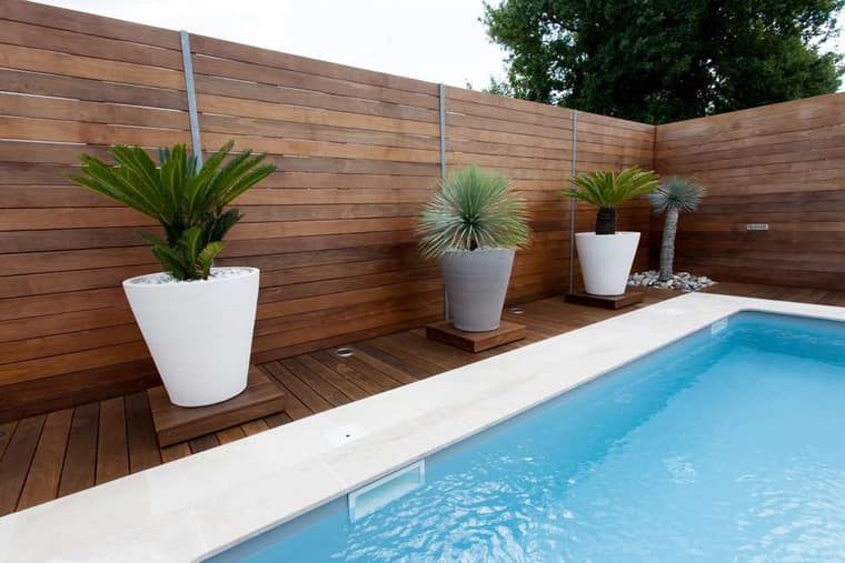Hardwood pool decking and fence with built in lighting Cape Town Hout Bay